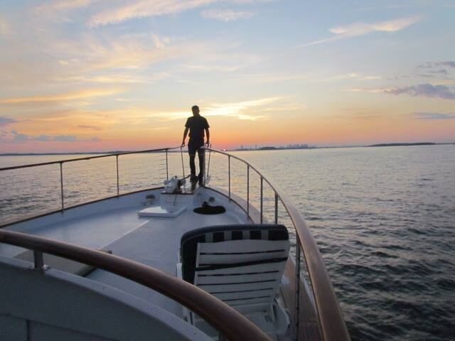 Beautiful Sunset Off The Bow of a Yacht
